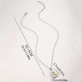 Marketa Praha | Náhrdelník s objetím psa